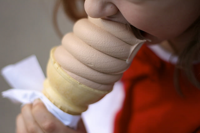 How an Ice Cream Cone Exposed the True Nature of Working Below the Line Girl eating a chocolate ice cream cone